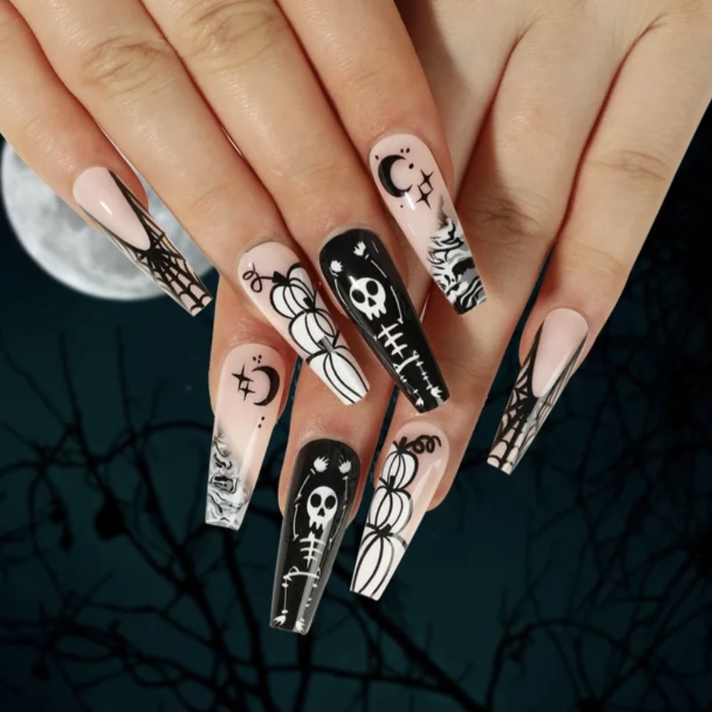 Halloween Themed Nail Art with Black and White Design